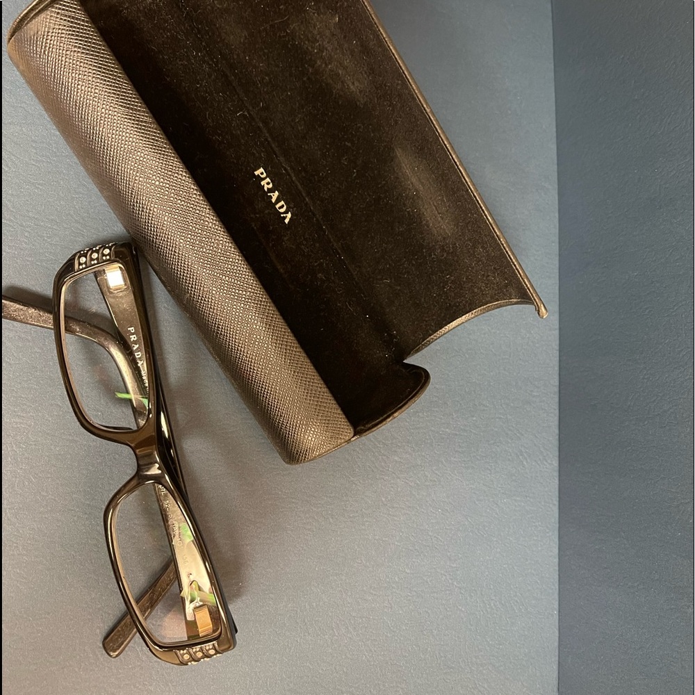 Prada glasses with case for prescription lenses.